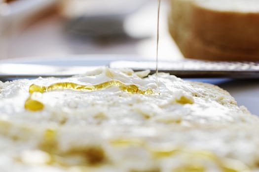 slices of bread with honey and butter