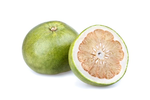 Fresh Pummelo (Citrus grandis) half cut and half isolated on white background