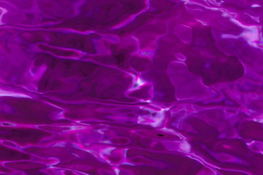 purple abstract background of wavy water surface (lilac)