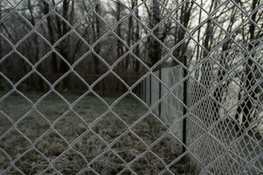 wire fence texture with hoarfrost overlay