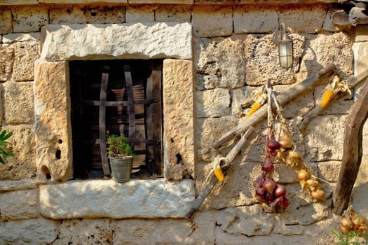 Traditional dalmatian stone house window with ornaments, Dalmatia, Croatia