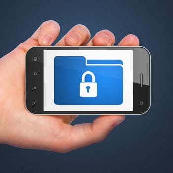 Business concept: hand holding smartphone with Folder With Lock on display. Generic mobile smart phone in hand on Dark Blue background.