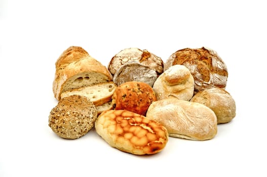Various breads isolated on white background.