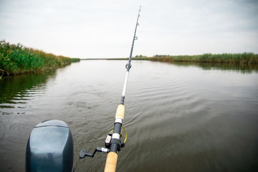 Fishing rod at the calm autumn river