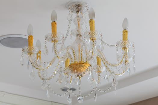 Crystal chandelier on ceiling