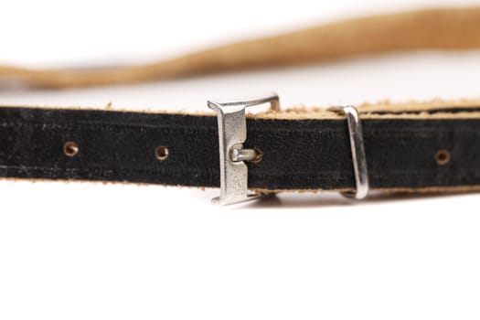 Black leather belt with a rectangular buckle isolated on white background