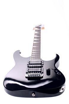 Beautiful black electric guitar isolated over white