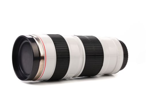Thermos in the form of the lens. White background.
