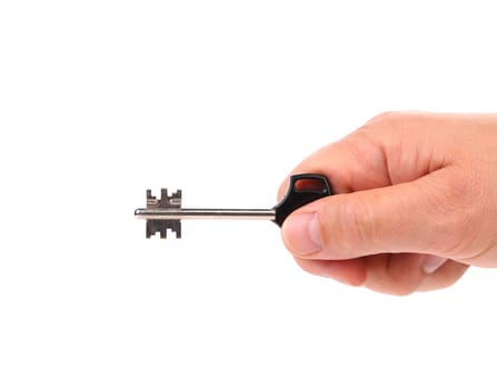 Hand holds modern steel-plastic key. White background.