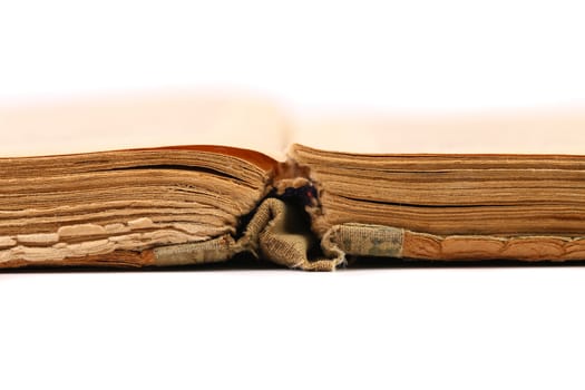 Opened old book isolated on a white background