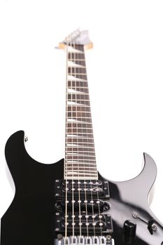 Beautiful black electric guitar isolated over white