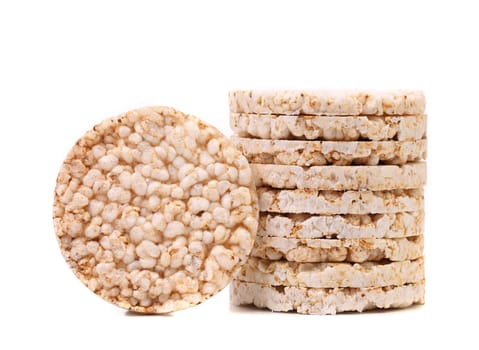 Stack of corn crackers. Close up. White background.