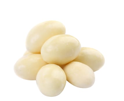 Candy in white chocolate isolated on a white background.
