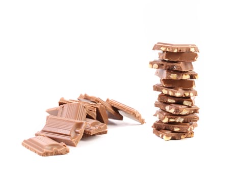 Milk chocolate bar with nuts isolated on white background
