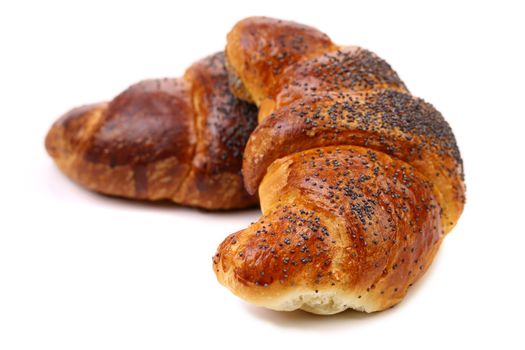 Image of croissant with poppy. White background.