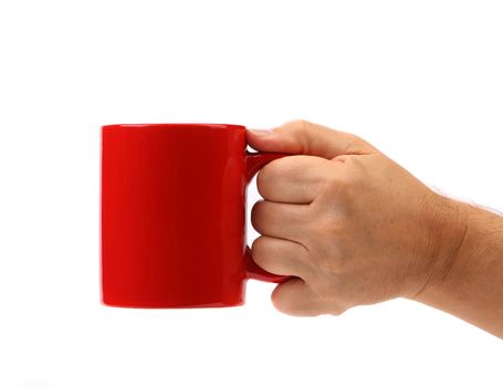 Hand hold red mug. Isolated on a white background.