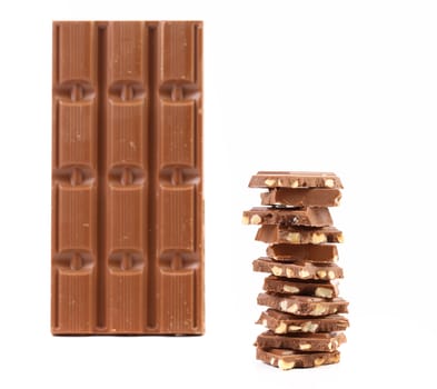 Milk chocolate bar with nuts isolated on white background