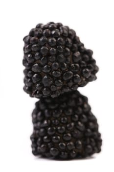 Stack of jujube colored balls on a white background