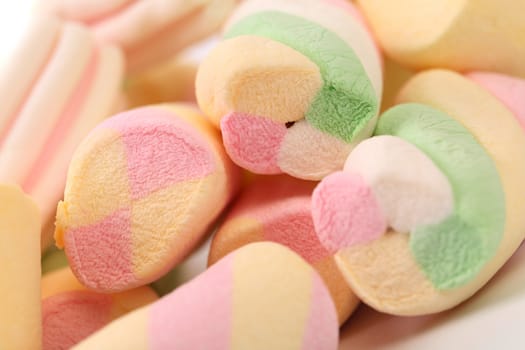Different colorful marshmallow. Close up. Whole background.