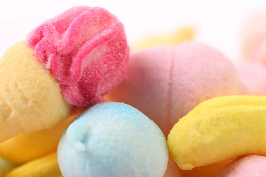 Different colorful marshmallow. Close up. Whole background.
