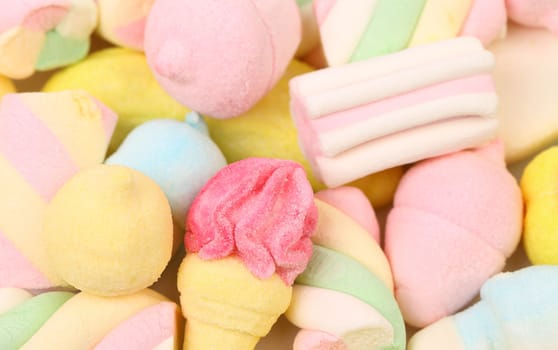 Different colorful marshmallow. Close up. Whole background.