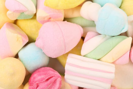 Different colorful marshmallow. Close up. Whole background.