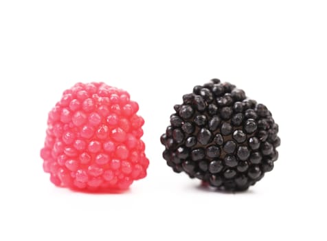 Two jujube colored balls on a white background