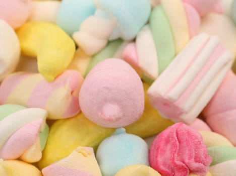Different colorful marshmallow. Close up. Whole background.
