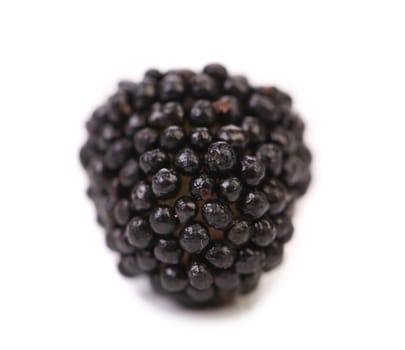 Black jujube colored balls on a white background