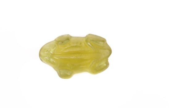Fruit jelly in form of green frog. Isolated. Close up. White background.