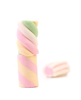 Three different colorful marshmallow. Close up. White background.