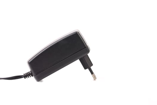 Electric power adapter. Close up. White background.