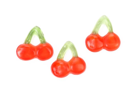 Fruit jelly in form of cherries. White background.