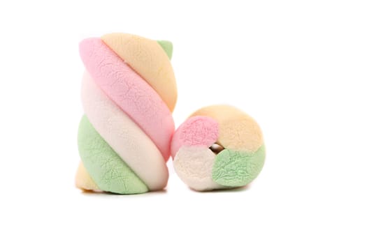 Two colourful marshmallow. Close up. White background.