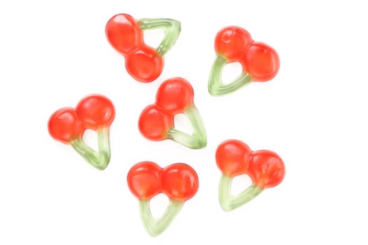 Fruit jelly in form of cherries. White background.