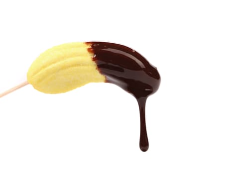Marshmallow in chocolate syrop. Isolated. White background.