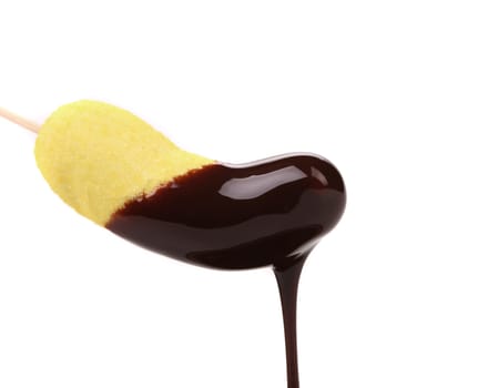 Marshmallow in chocolate syrop. Isolated. White background.