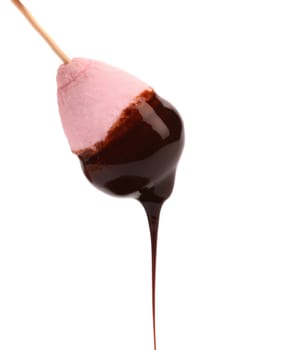 Marshmallow in chocolate syrop. Isolated. White background.