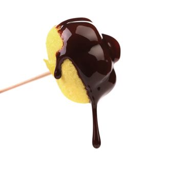 Marshmallow in chocolate syrop. Isolated. White background.