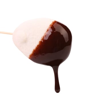 Marshmallow in chocolate syrop. Isolated. White background.