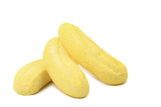 Marshmallow in form of a banana. White background.