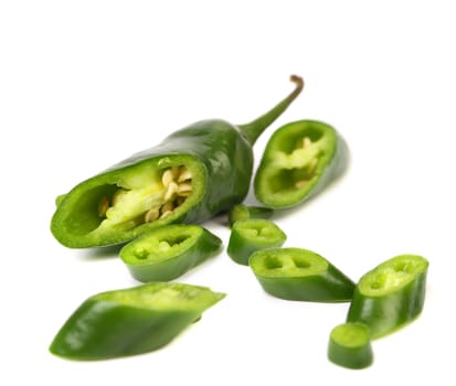Slices of green pepper isolated on a white background