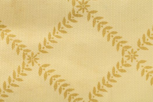 Background of light brown fabric. Texture. Close up.