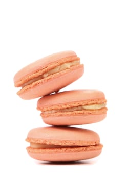Stack of macaron cakes. Close up. White background.
