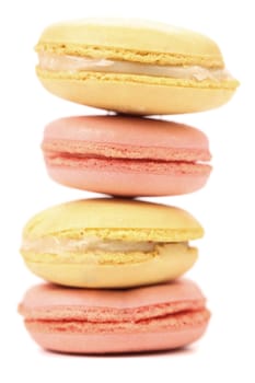 Stack of macaron cakes. Close up. White background.