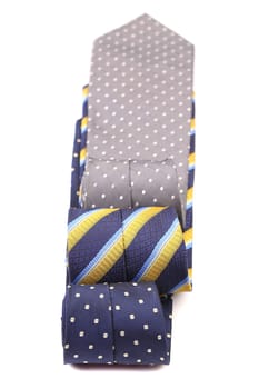 Three  multi-colored tie. Isolated on a white background.
