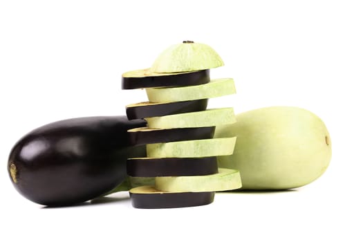 White and black eggplants. Slices. Isolated on a white background.