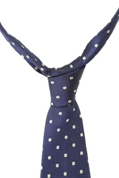 Blue tie with white speck. White background.