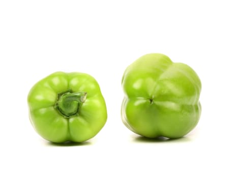 Green peppers isolated on a white background.