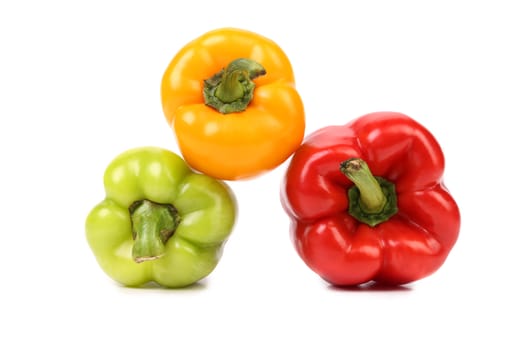 Peppers of different colors isolated on a white background.
